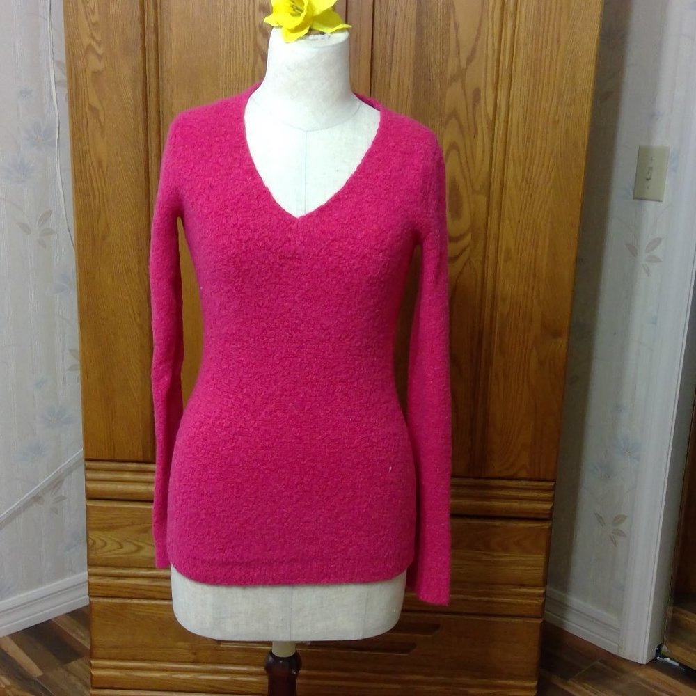 Pink long sleeved fitted sweater